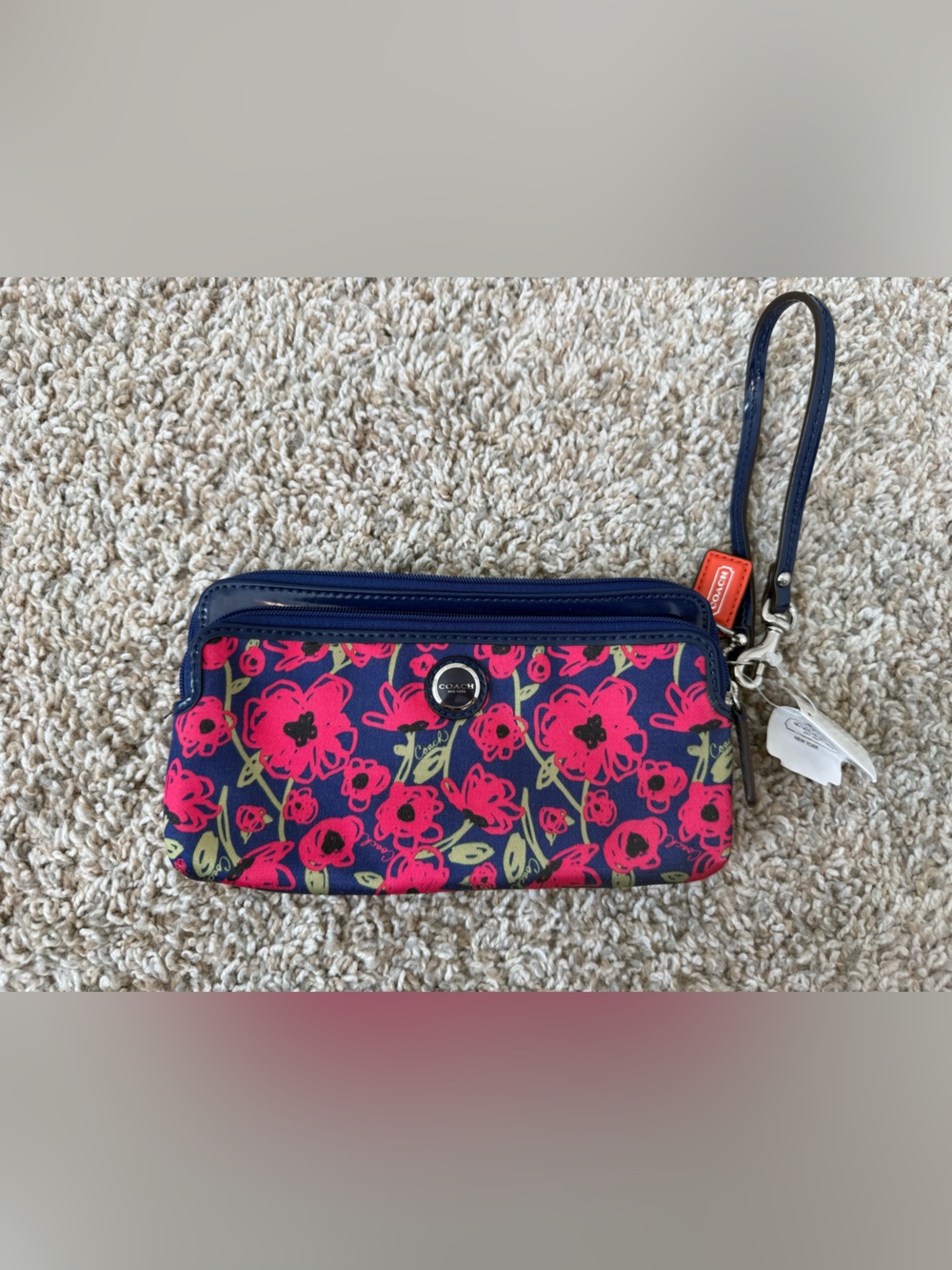 Coach Navy Wristlet with Bright Pink Floral Print